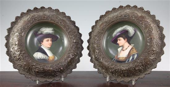 A pair of bronze framed Paris porcelain dishes, late 19th century, 29.5cm. diam. incl. frames
